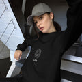 The Leo Mark sweatshirt: white line art lion on a dark unisex crewneck, Leo zodiac