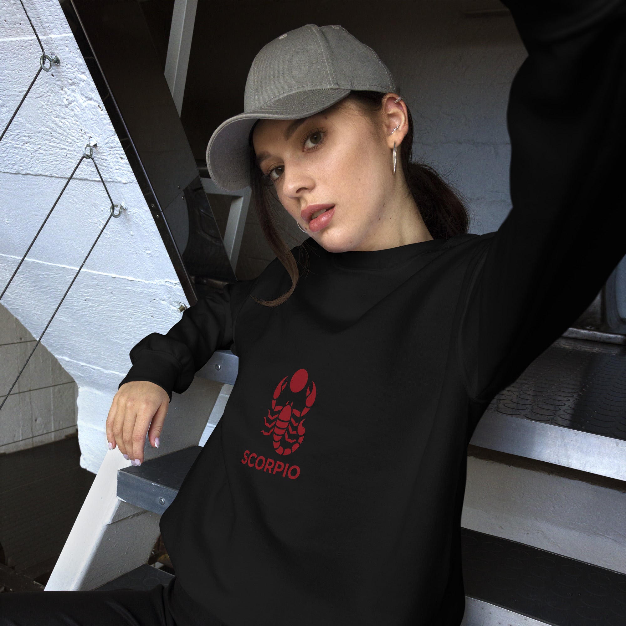 Blood Moon Rising sweatshirt: maroon scorpion under a red moon on a unisex crewneck