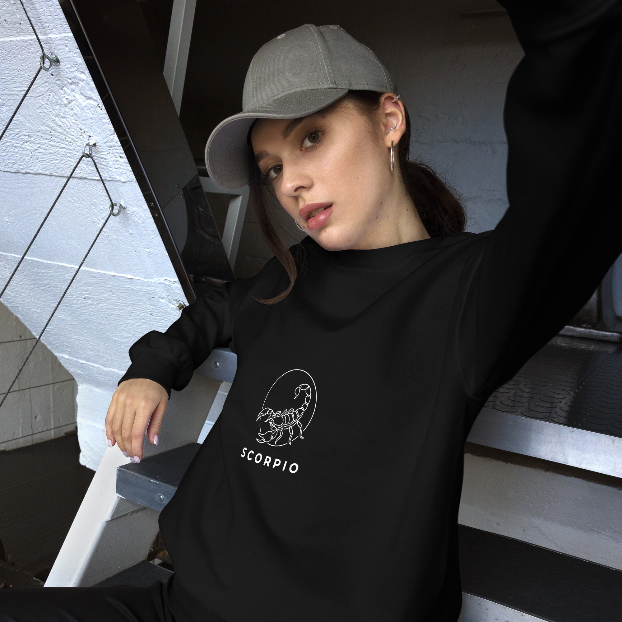 Moonlit Sting sweatshirt: line art scorpion beneath a moon on a unisex crewneck