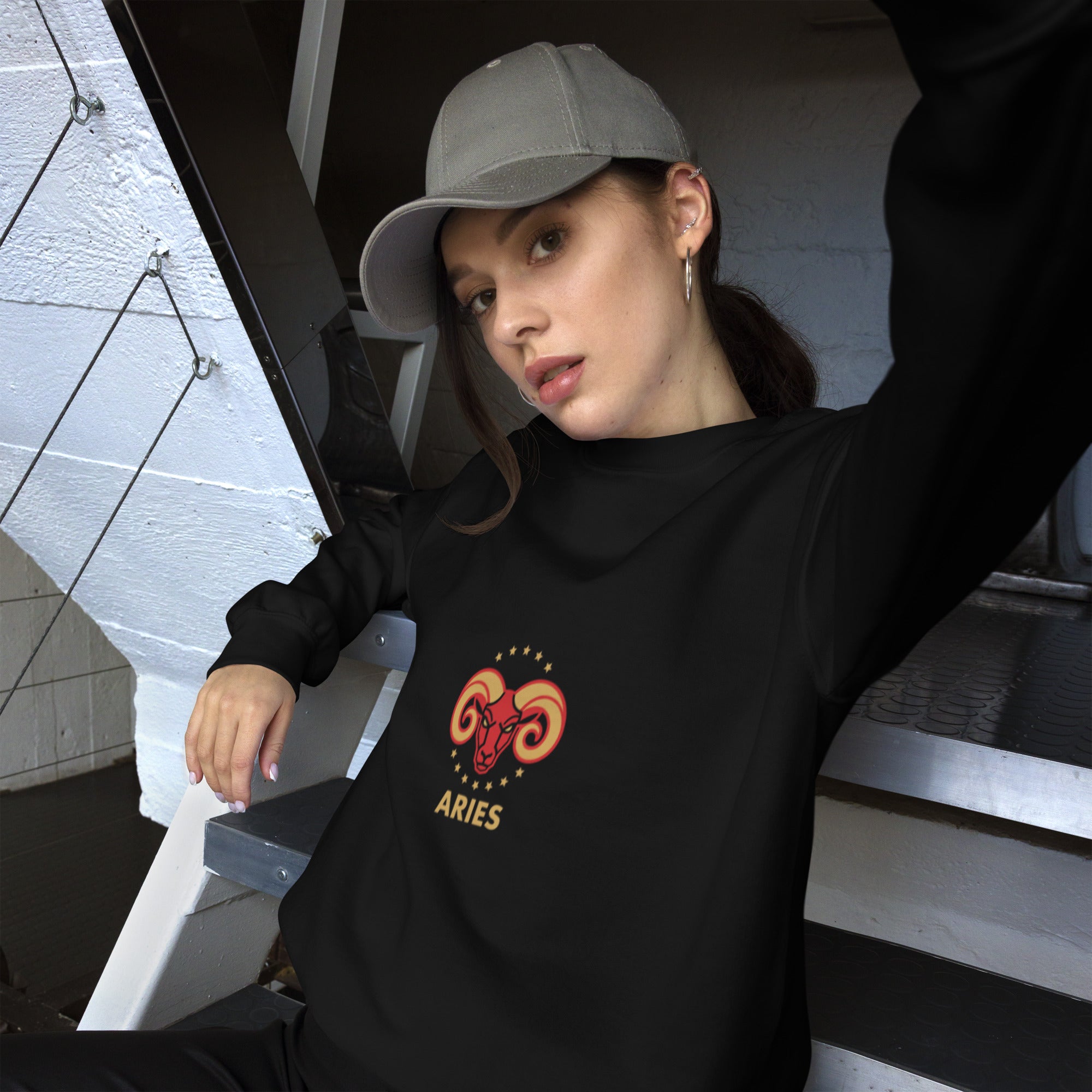 Golden Horn sweatshirt: crimson ram with gold stars on a unisex crewneck