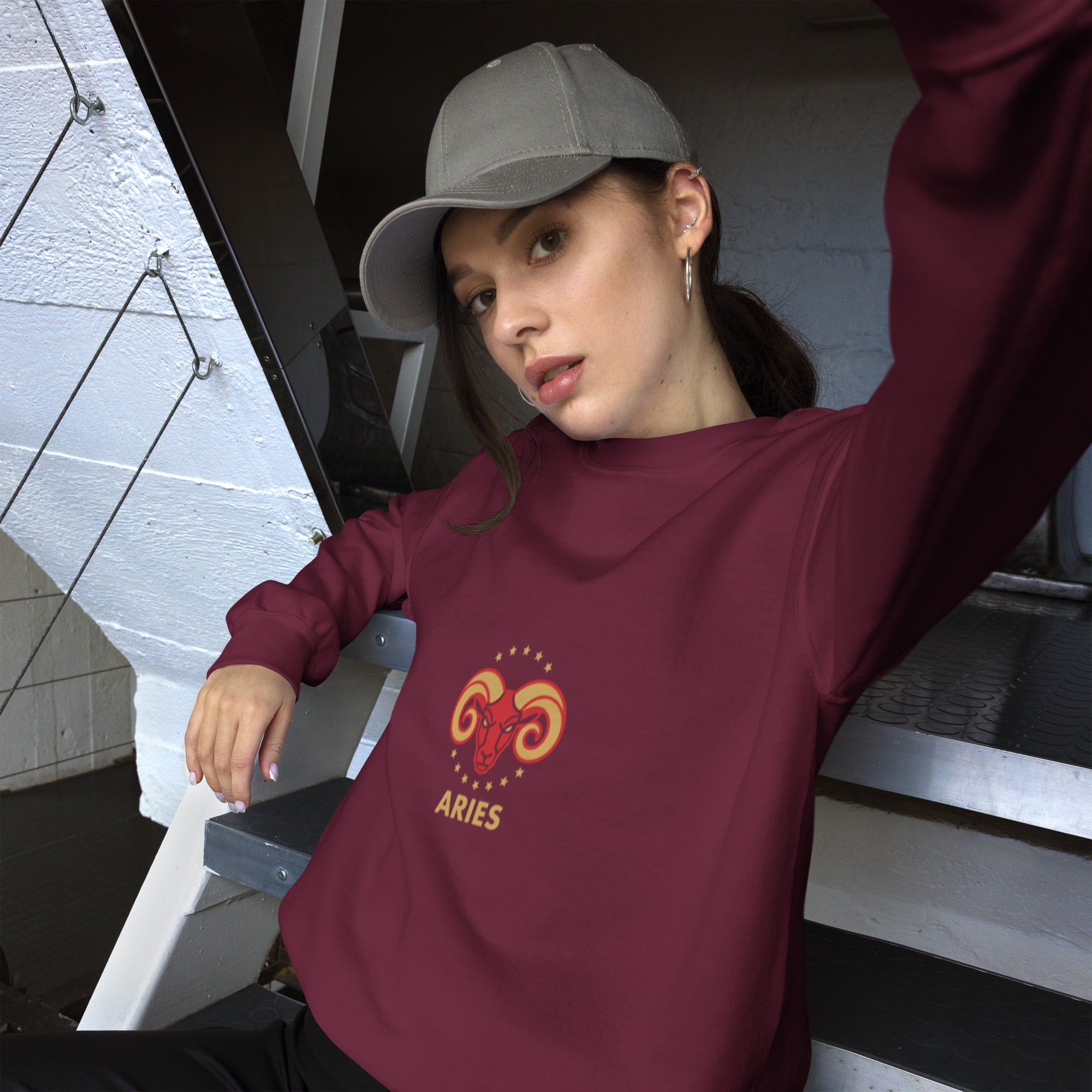 Golden Horn sweatshirt: crimson ram with gold stars on a unisex crewneck