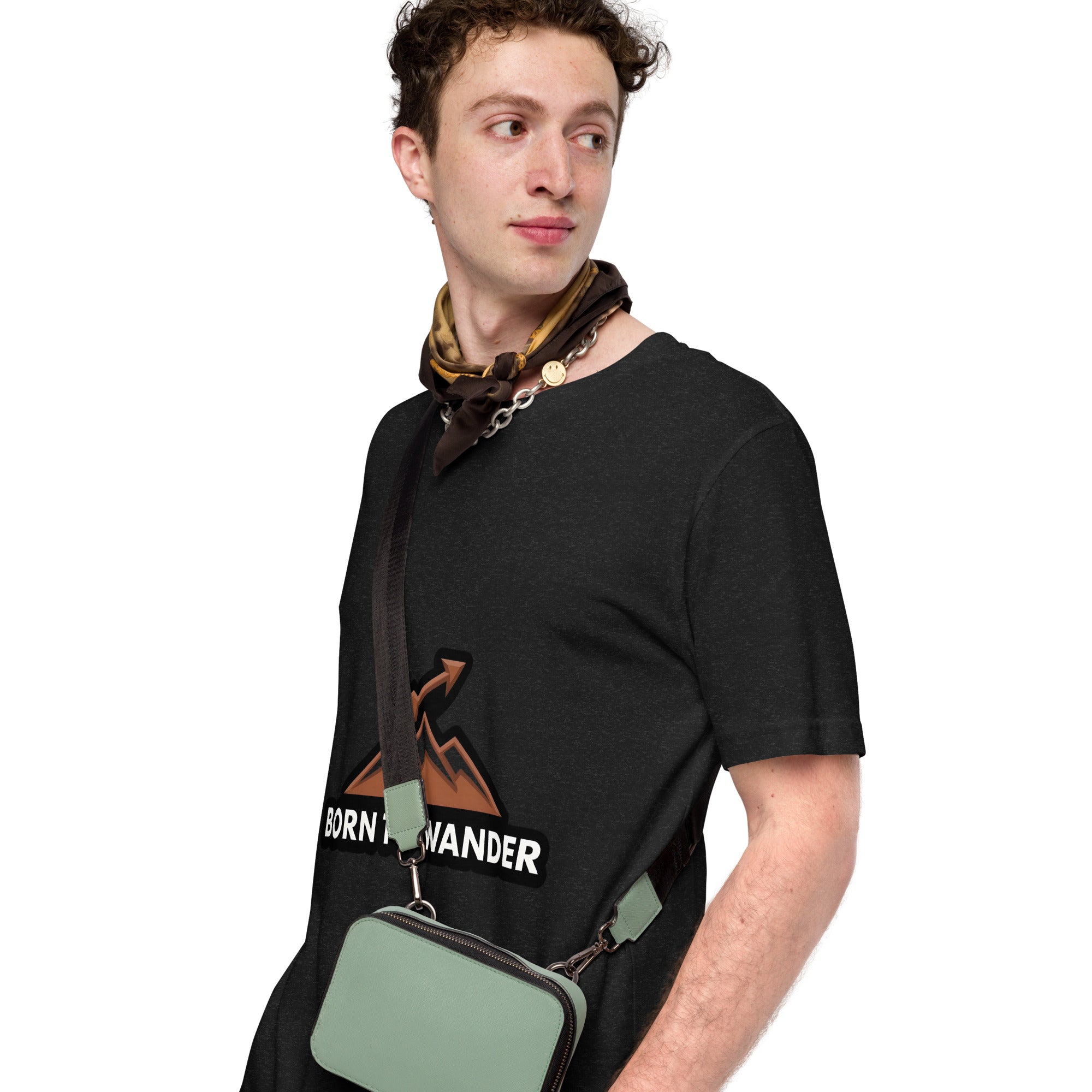 Born to Wander tee: arrow over mountain peaks in burnt sienna on a unisex Sagittarius t-shirt