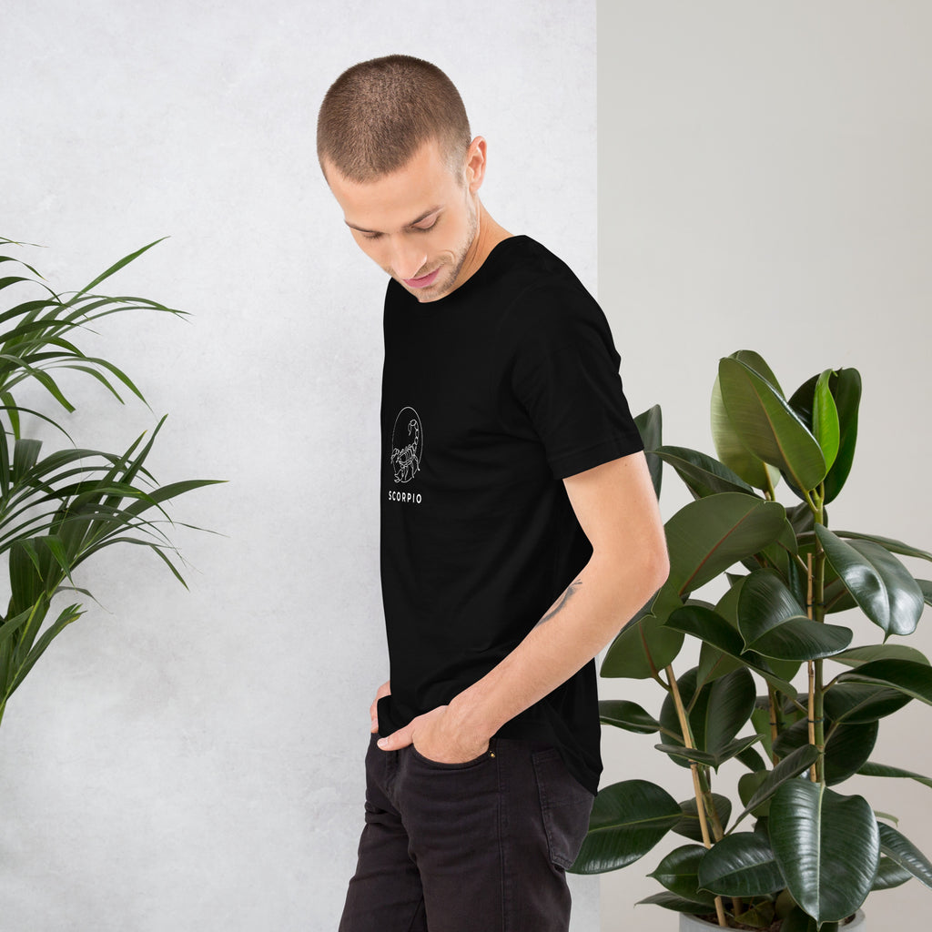 Moonlit Sting tee: white line art scorpion beneath a moon on a dark unisex Scorpio t-shirt