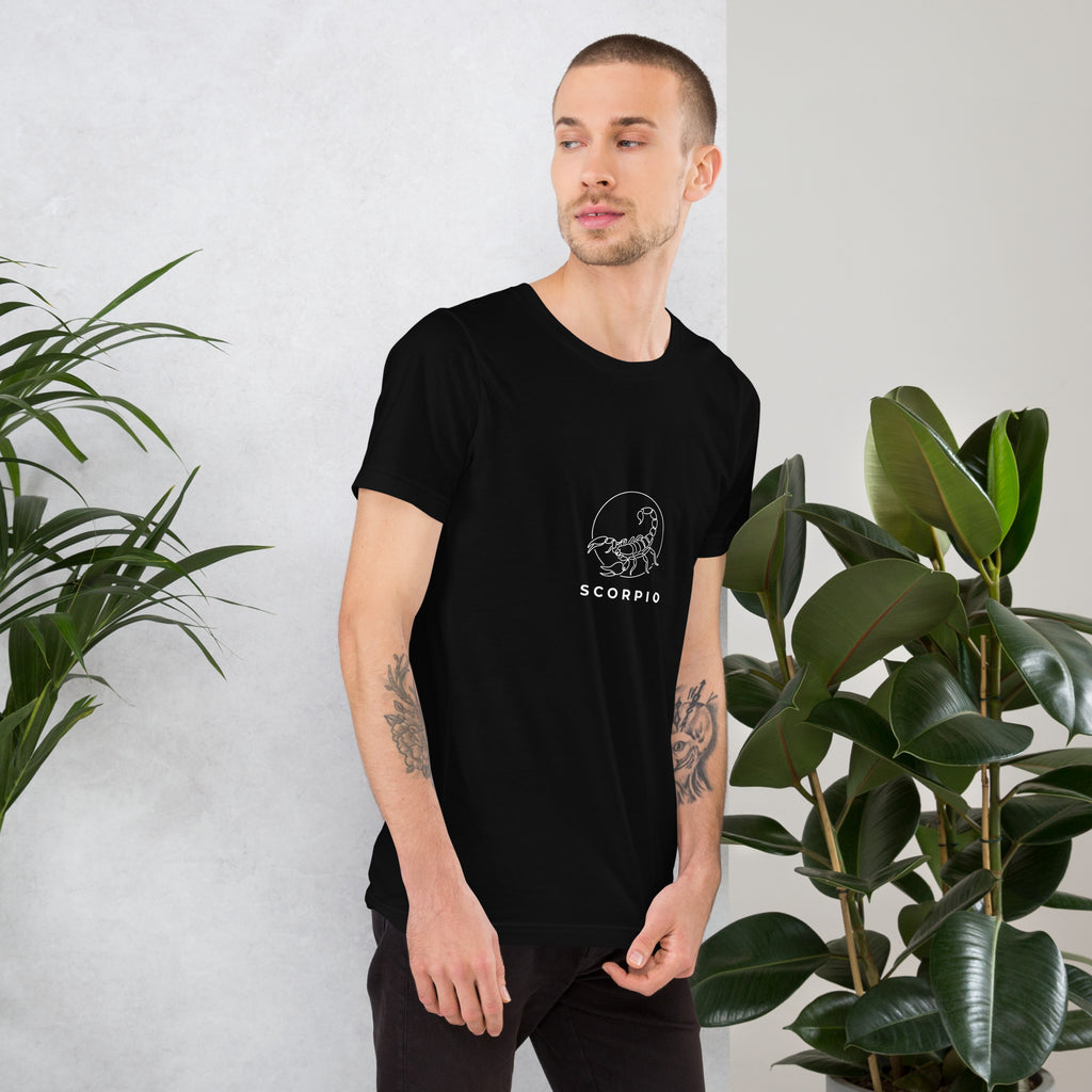 Moonlit Sting tee: white line art scorpion beneath a moon on a dark unisex Scorpio t-shirt