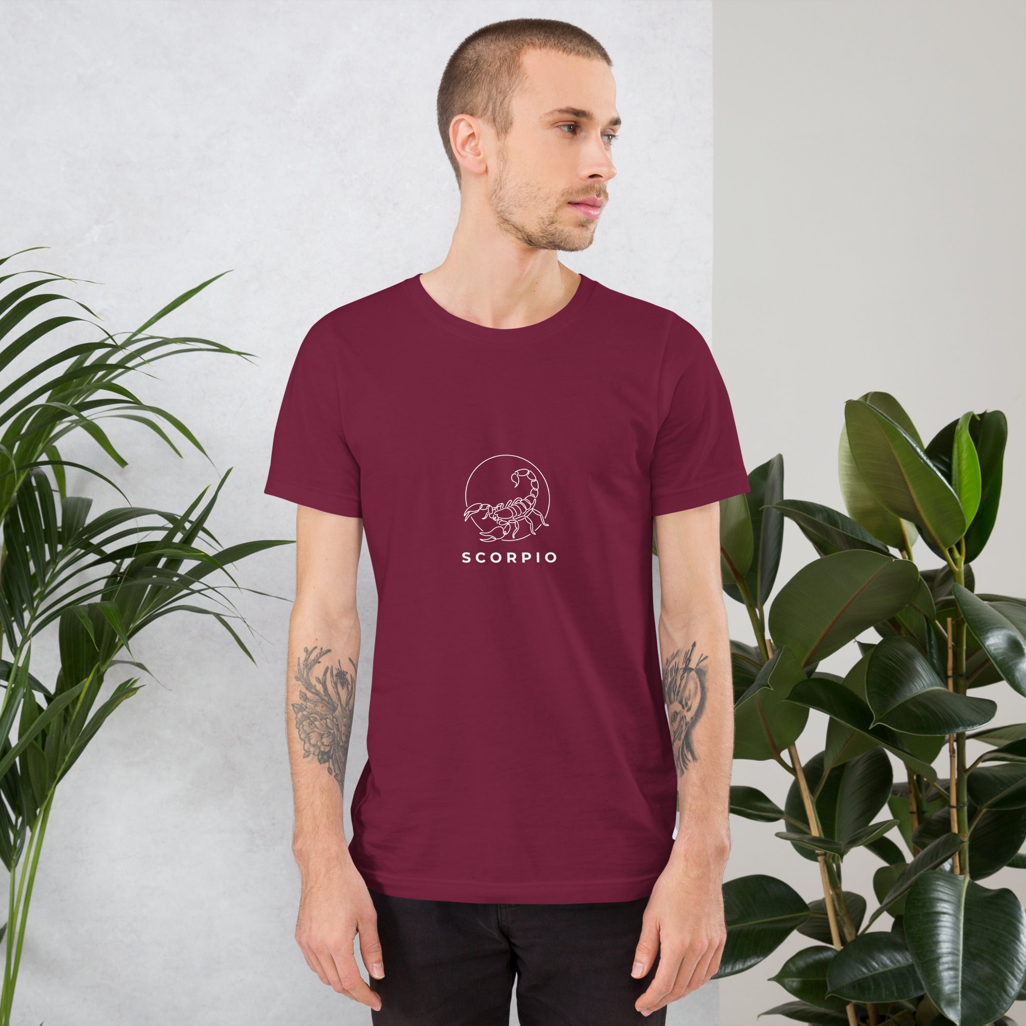 Moonlit Sting tee: white line art scorpion beneath a moon on a dark unisex Scorpio t-shirt