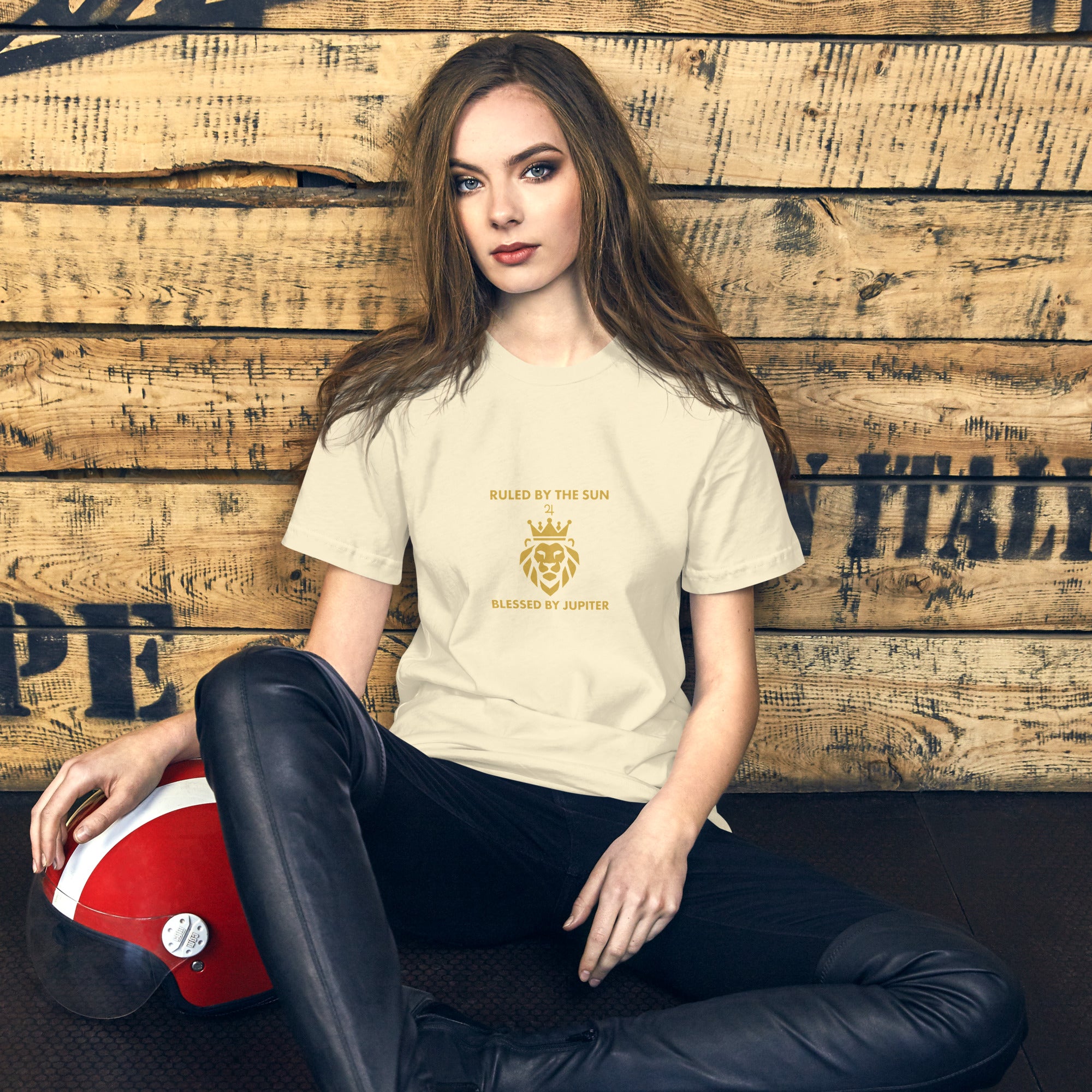 Ruled by the Sun tee: gold crowned lion with Jupiter symbol on a unisex Leo t-shirt